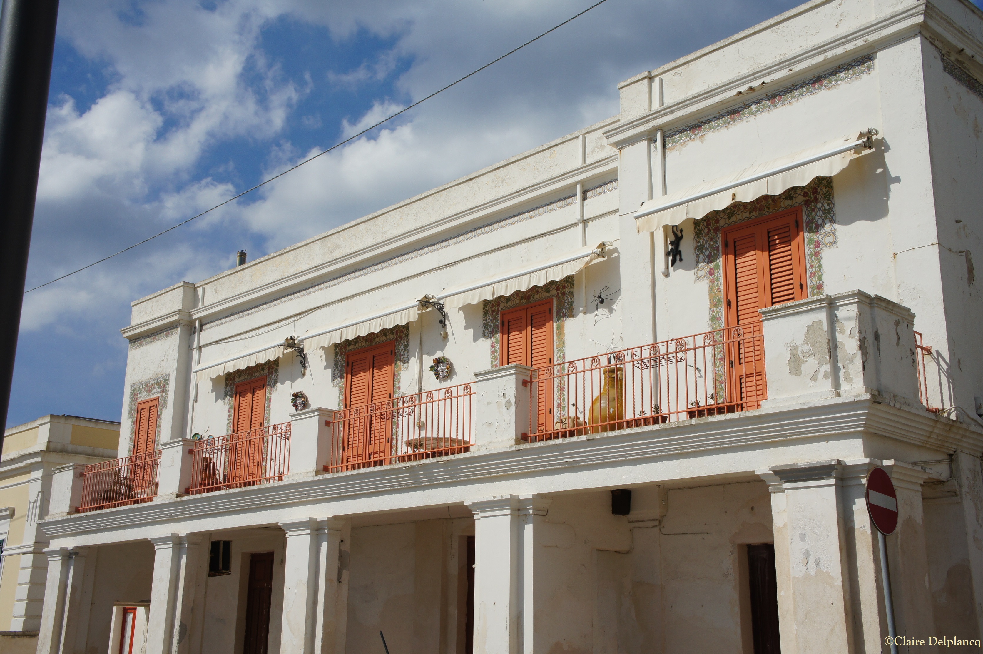 Leuca house with orange blinds