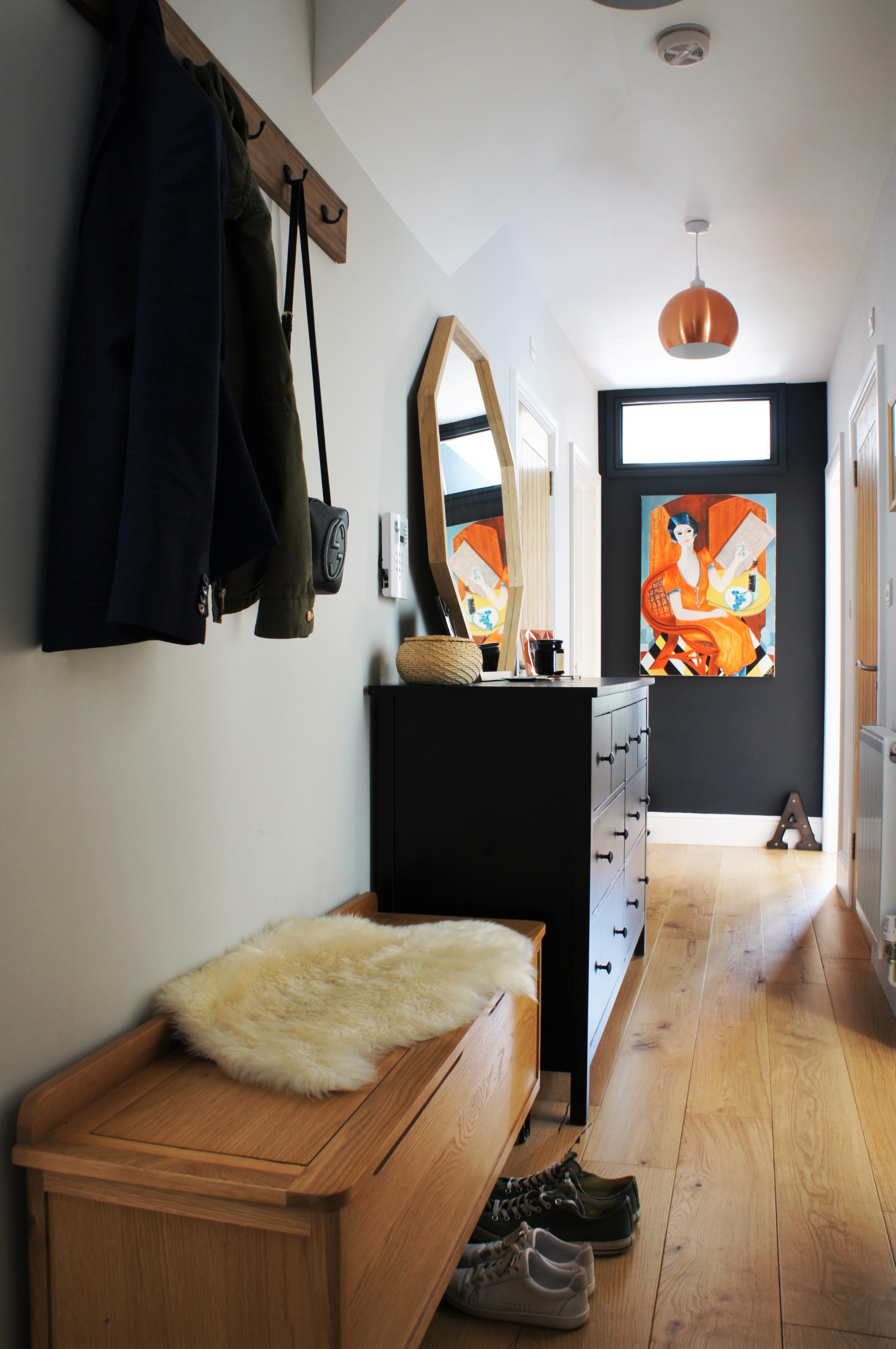 Black wall in corridor