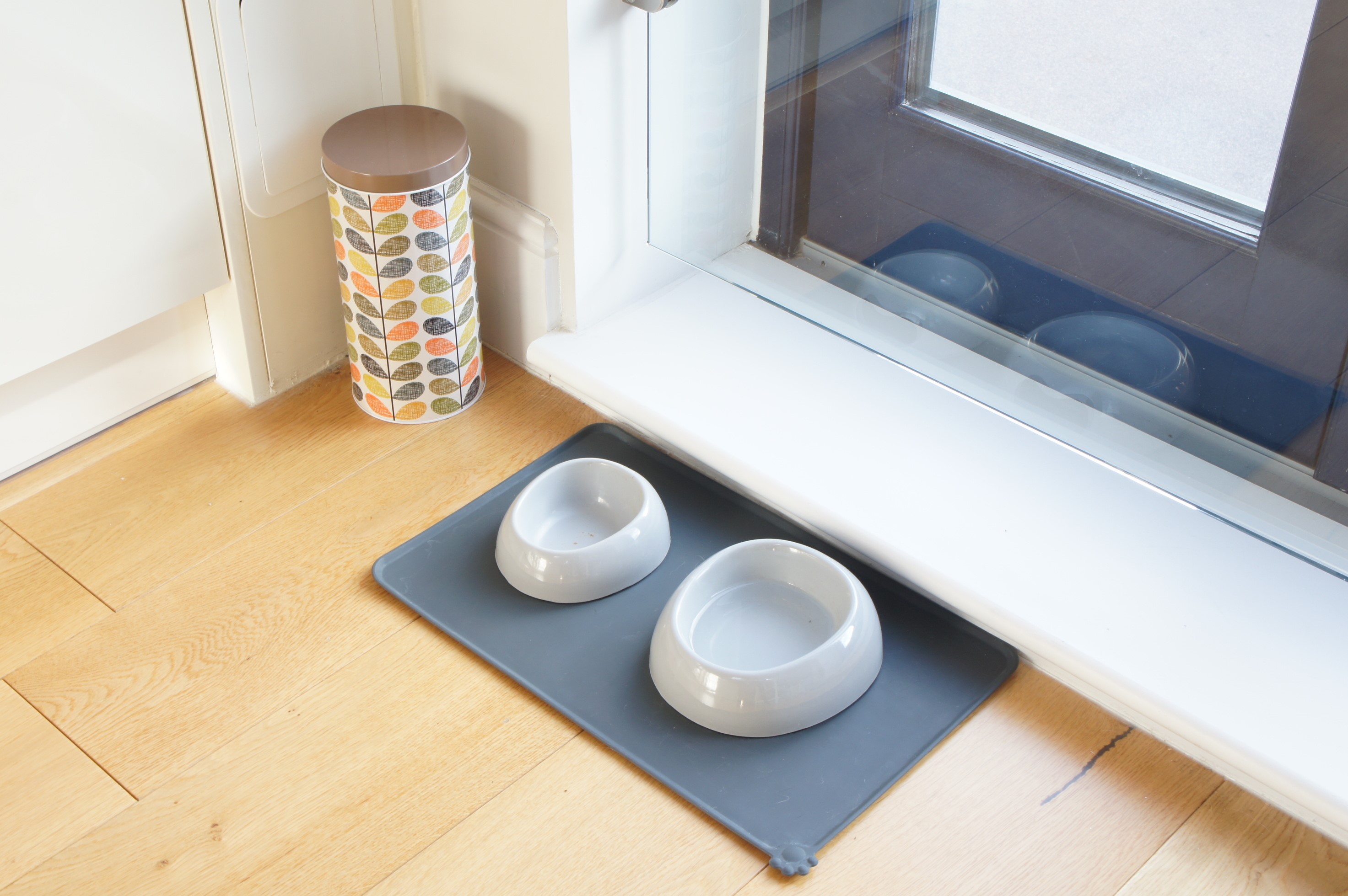 Cat food bowls and Orla Kiely canister