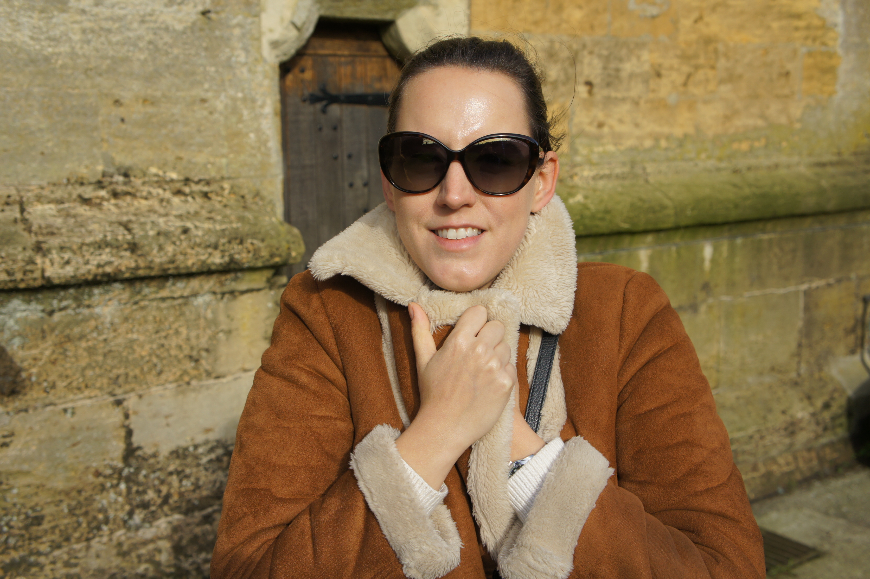 Topshop shearling coat and Marc Jacobs sunglasses
