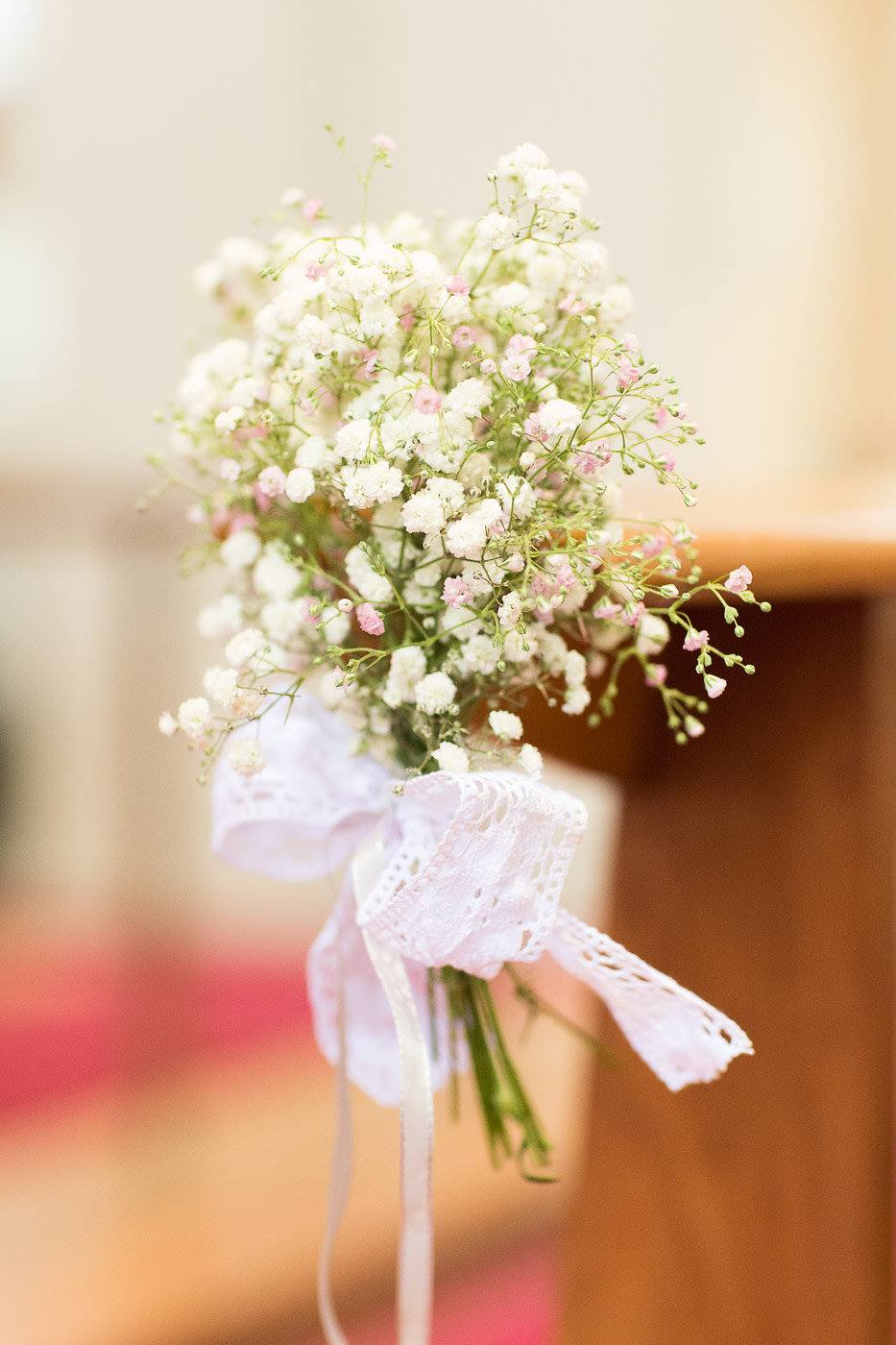 Church bench flowers