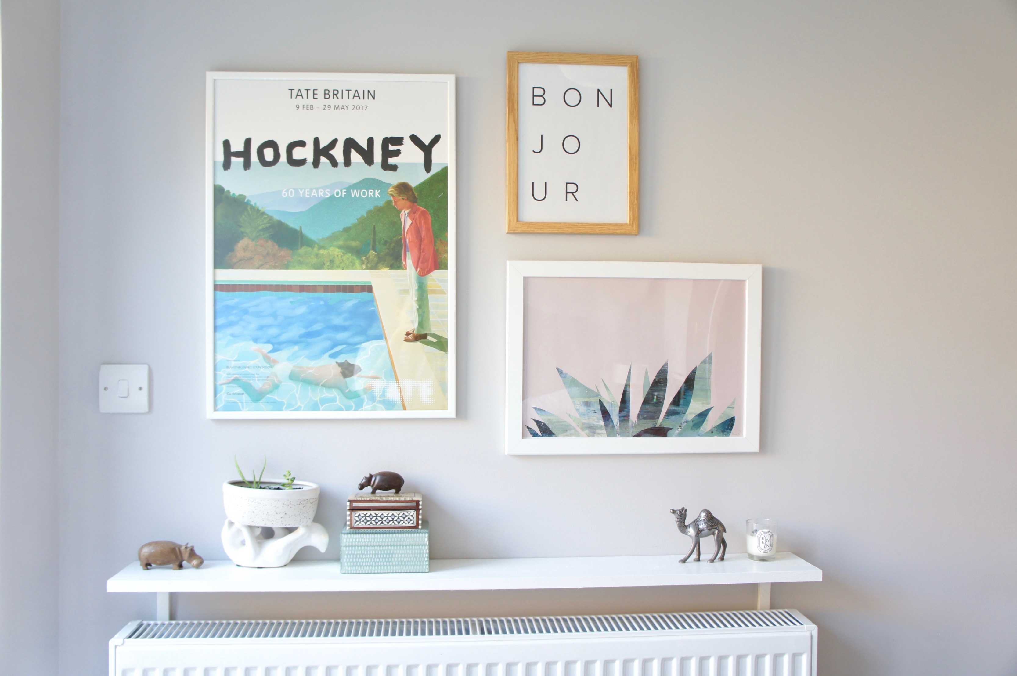 Grey bedroom gallery wall