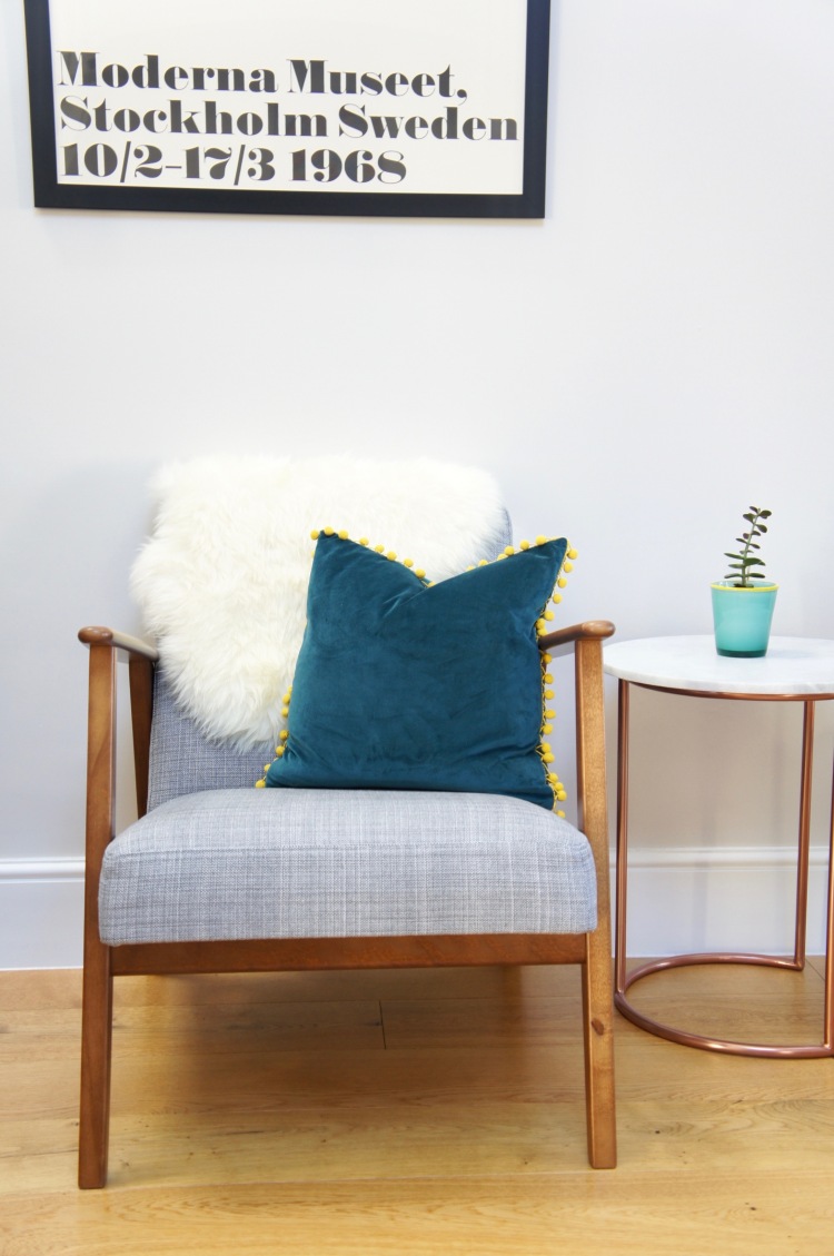 TK Maxx teal velvet cushion - 5 tips to easily save money when decorating your home
