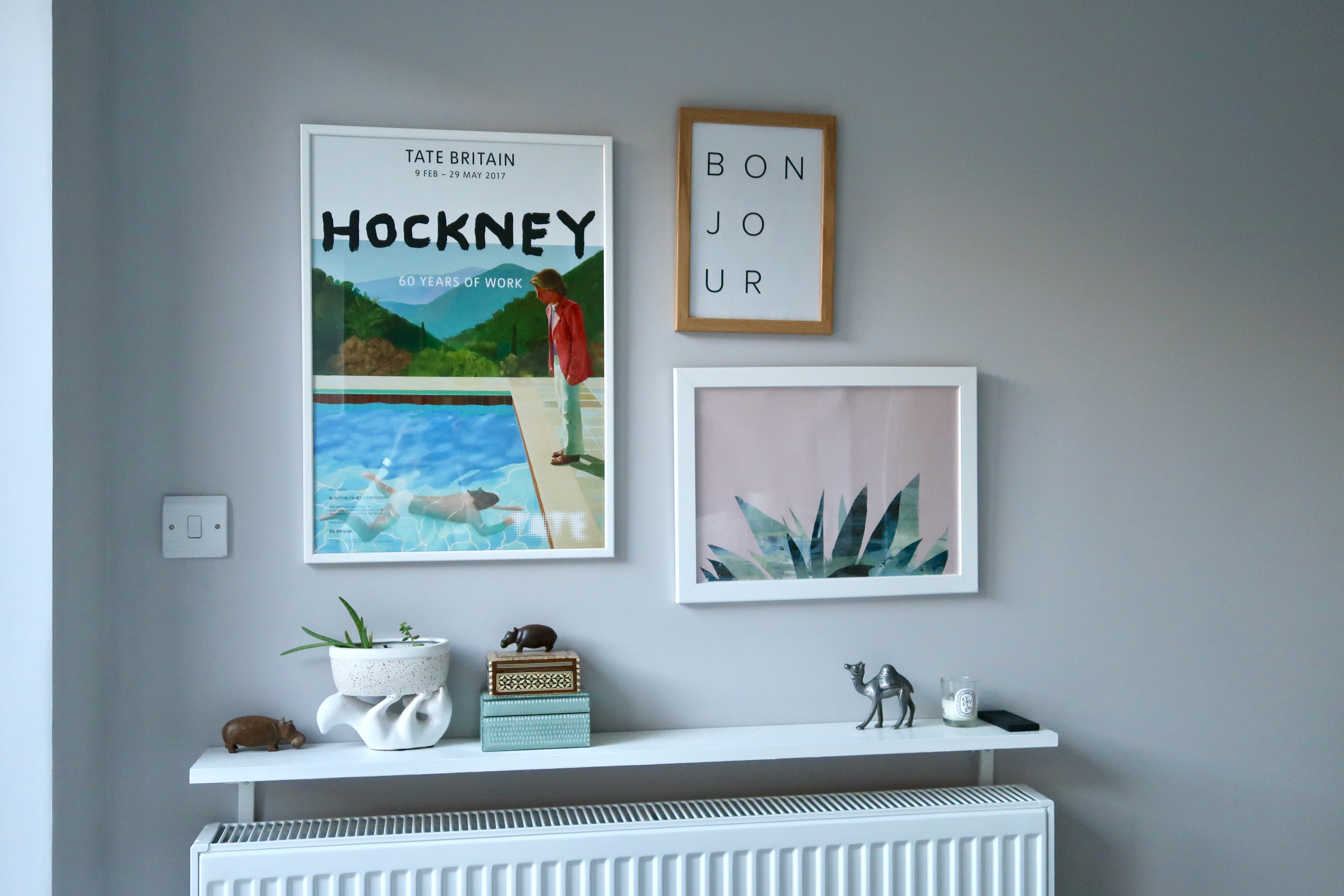 Master bedroom gallery wall